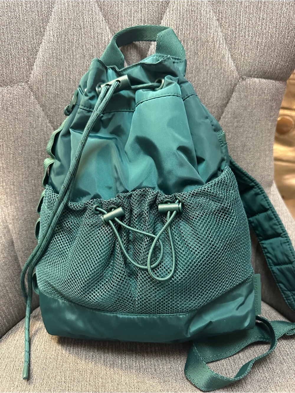 Dange Dover Teal Drawstring Mesh Pocket Women’s Sling bag